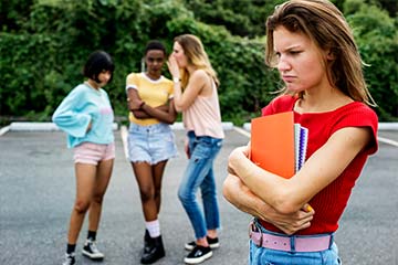 Young girl being bullied at school