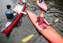 Young girl in kayak at Camp Presqu'ile