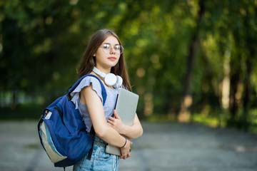 Young girl walking home from school