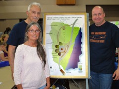 Susan Staves with Committee Members and drawing of garden project