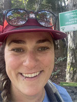 Megan "Scotia" Hutton smiling on trail